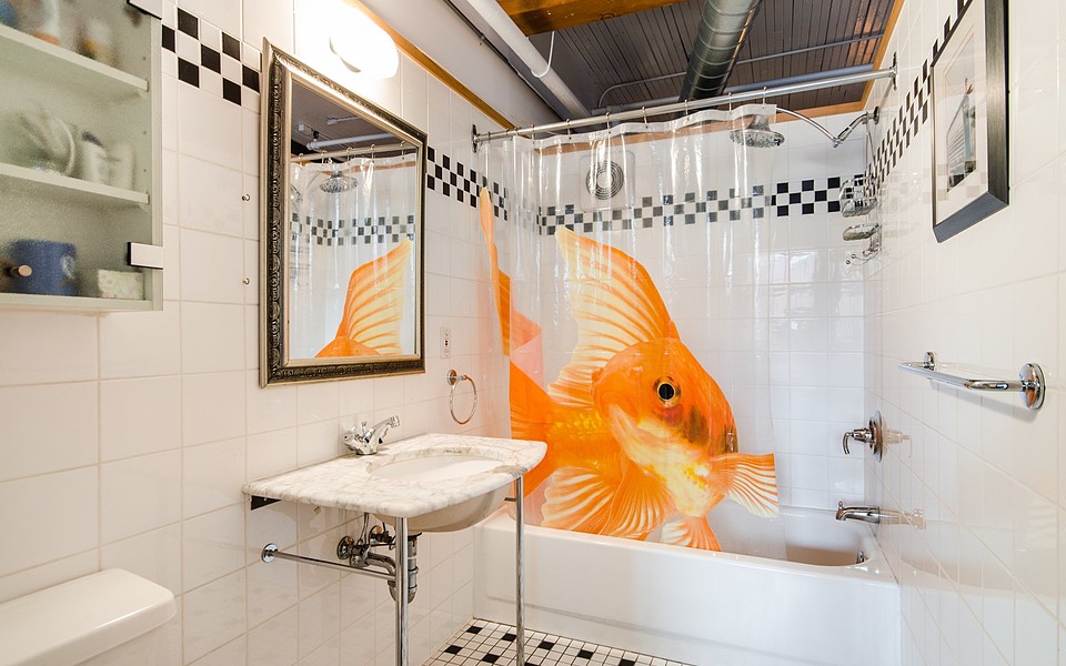 Ce magnifique condo artistique et moderne sur le Plateau est en vente